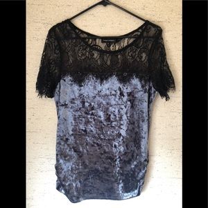 Blue velour top with lace.